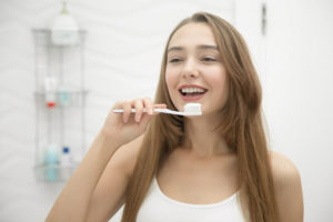 Women with toothbrush - Oral Health
